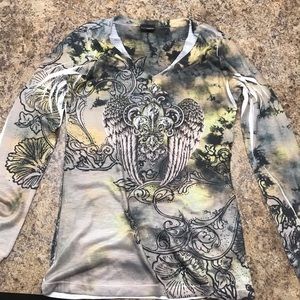 Long sleeved Daytrip brand shirt. Size large